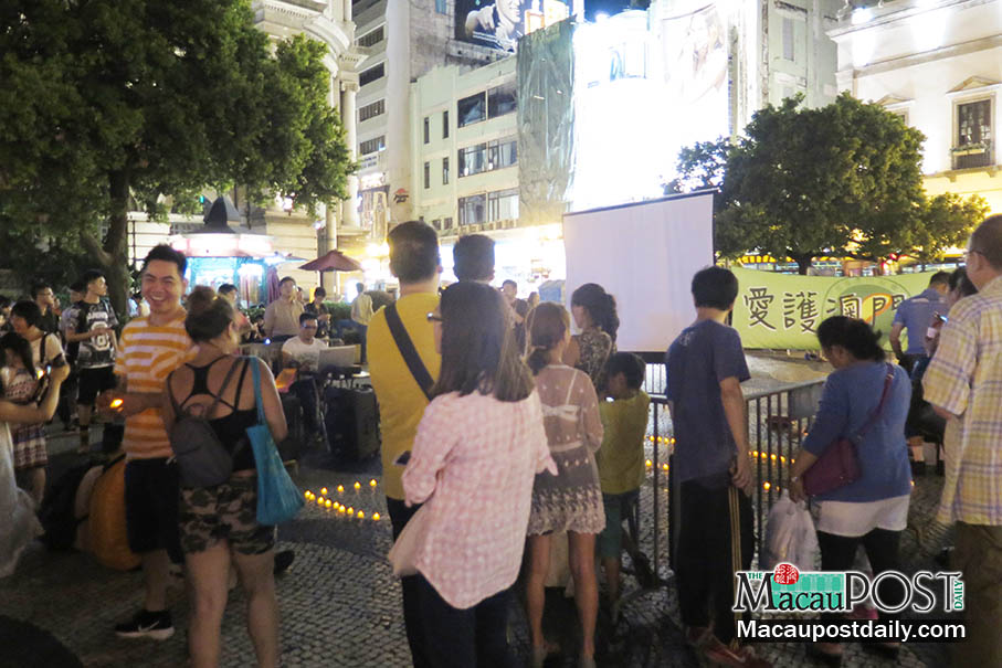 Group holds vigil urging officials’ accountability