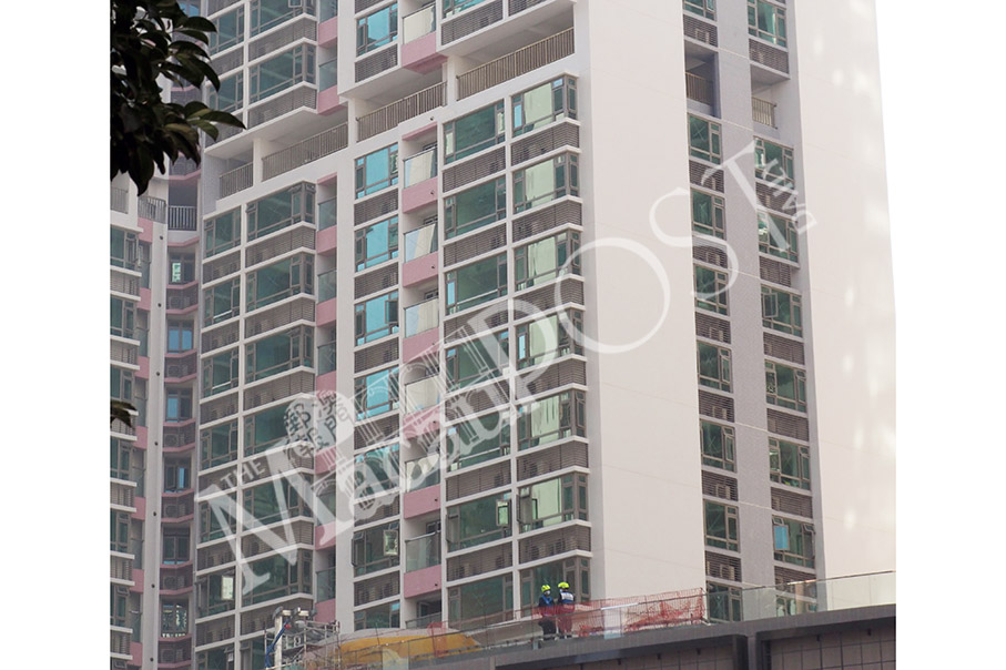 Workers protest on rooftop over labour row