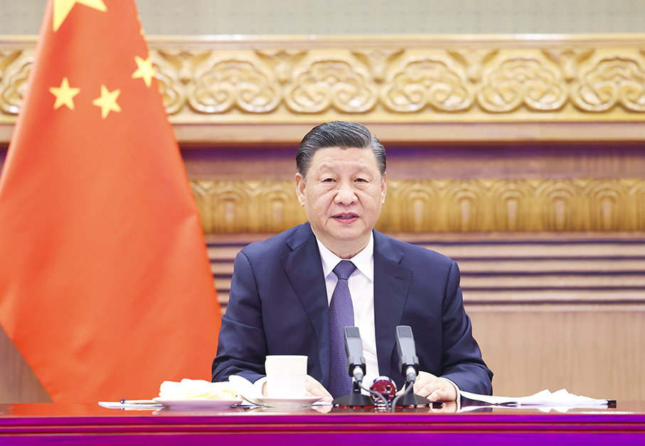 Xi stresses joint China-US efforts for world peace, tranquility in video call with Biden