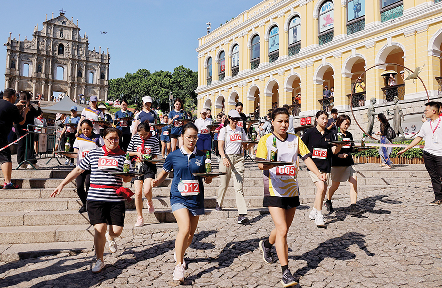 Filipino wins Tray Race on World Tourism Day